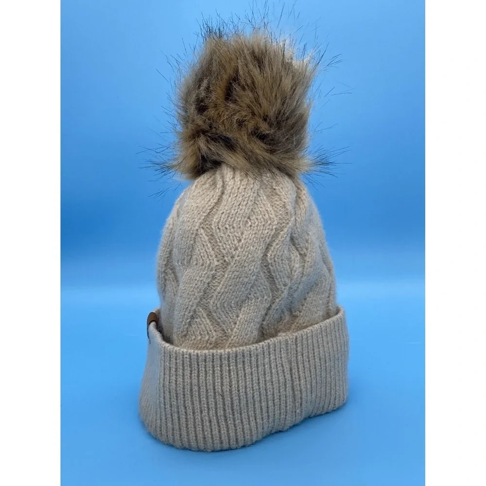 Britt's Knits Beige knit winter hat with faux fur pom pom